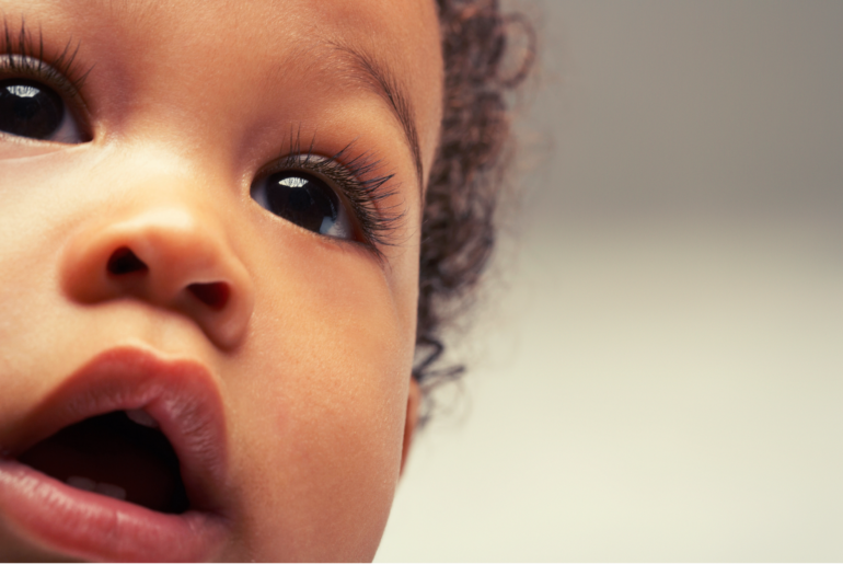 Close up on baby's face.