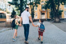 Dad takes kids to library